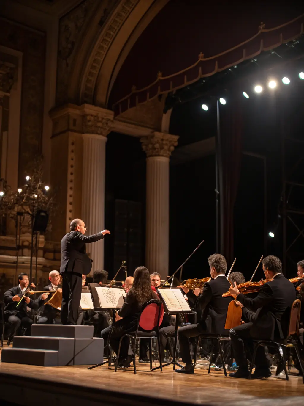 A photograph of a classical music ensemble performing in a grand concert hall, showcasing the elegance and sophistication of a classical music event.